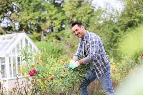 Cropped image of a gardener communicating with a customer during an on-site visit